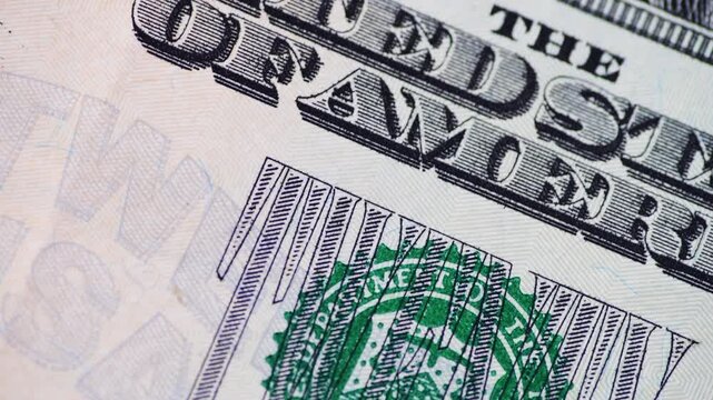 Macro close up of the Department Of The Treasury symbol on a US Dollar bill.