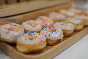 Colorful Donuts isolated on white background. Donuts frosting sprinkles