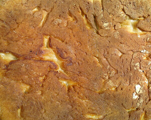 Bottom of fresh wheat bread. View texture food baking the product. Closeup.