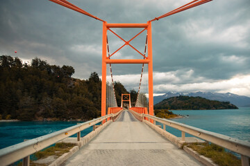 road with bridge and blue lake