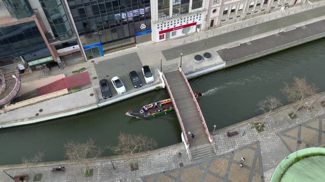 Aerial view of Aveiro city and Ria de Aveiro, Moliceiro Boats are floating by City Channel in Aveiro, Portugal