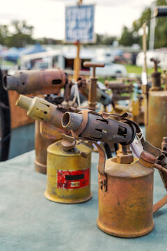 A collection of vintage blow torches