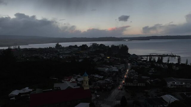 Aerial view time-lapse Flyover of UNESCO World Heritage Church of Chonchi Chiloe 