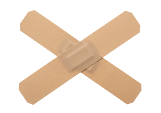 Isolated Two Beige Band-Aids Intersecting Each Other in Cross Shape