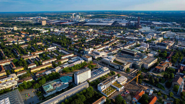 Aerial view around the downtown of the city Wolfsburg on an sunny spring day	
