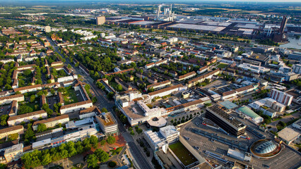 Aerial view around the downtown of the city Wolfsburg on an sunny spring day	
