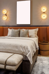 Modern bedroom with a blank frame mockup over a bed with a leather headboard. Includes a bench,...