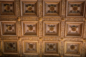 Golden Coffered Ceiling Detail of Santa Maria Maggiore Basilica in Rome.
Close-up of ornate golden coffered ceiling inside Santa Maria Maggiore basilica