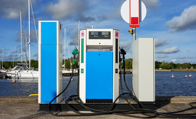 Boat fuel station with gasoline and diesel pumps.