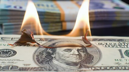 Burning money financial loss - Powered by Adobe