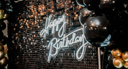 Happy birthday inscription on a shiny glitter background. Party, event, celebration