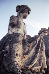 The damaged sculpture, missing arms and aged by time, stands in a historic public fountain © Kristyna