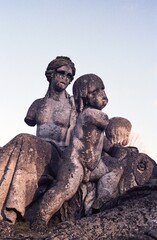 The damaged sculpture, missing arms and aged by time, stands in a historic public fountain © Kristyna