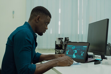 Black engineers are programming in an academic classroom for learning