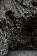 Close-up of the black sand beach of Reynisfjara with basalt columns