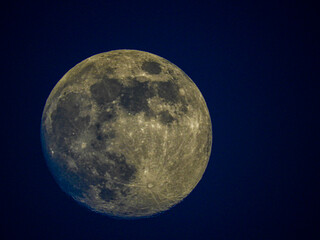 Full Moon Close-Up against Dark Blue Sky