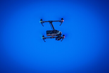 Drone lands on the street flying around city