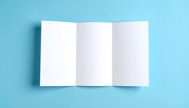 Blank tri-fold brochure on a blue background, ideal for customizable marketing materials