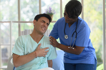 The doctor is taking care of a patient in the ward.