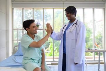 The doctor is taking care of a patient in the ward.