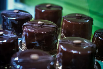 Cakes cream chocolate exhibited in a number of chocolate