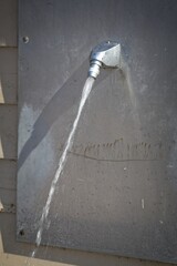 Silver Water Faucet with Flowing Stream