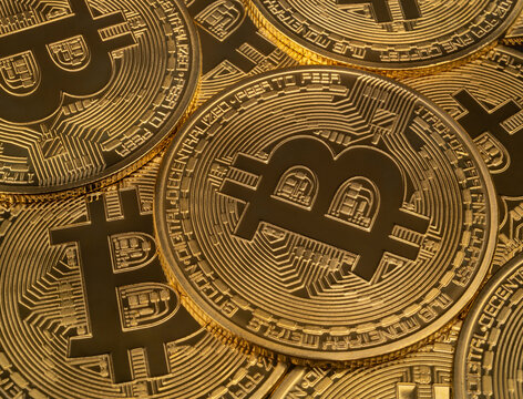 Close-up of gold bitcoins