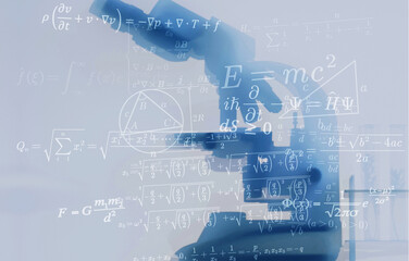 Silhouette of microscope super-imposed with mathematic and scientific formulas