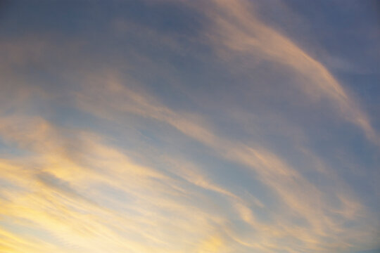 Cirrus clouds against sky at sunset