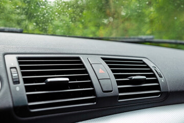 Car dashboard air ventilation grills. Close up shot, no people