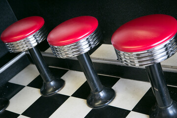 Swivel stools at diner counter