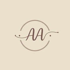 Elegant AA monogram logo design featuring intertwined letters within a circular frame, perfect for branding, wedding invitations, or personalized stationery projects.