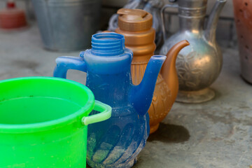Plastic water containers or ablution pitchers