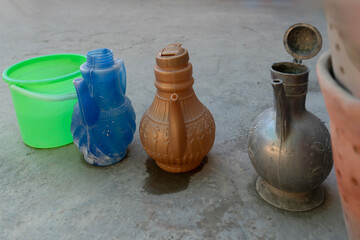 Plastic water containers or ablution pitchers