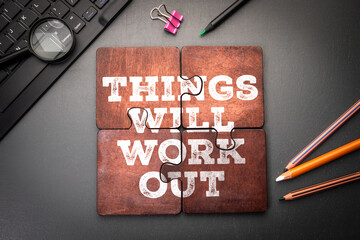Things Will Work Out. Motivational Puzzle Message on Desk with Office Supplies