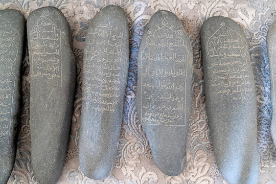 Samarkand, Uzbekistan - May 28, 2025: Some tombstones in the mausoleum of Imam al Matrudiy (Abu Mansura Maturidi's Mausoleum)