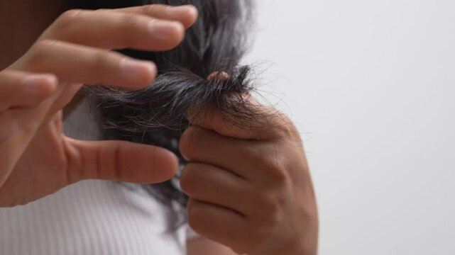 Women with split ends and dry, damaged hair