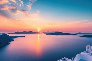 Fototapeta premium Beautiful sunset over the tranquil waters of Santorini island in the Mediterranean Sea, Santorini island of Cyclades in Mediterranean sea, Greece Calm sunset view