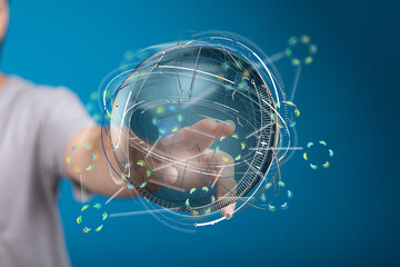 Hand interacting with a digital globe, showcasing global network, technology, and connection.