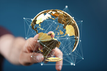 Hand interacts with a digital globe, showcasing global connectivity and networking.