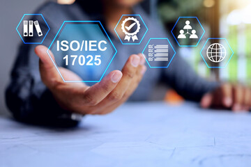 iso iec 17025 testing and calibration laboratory management concept with businessman holding the...