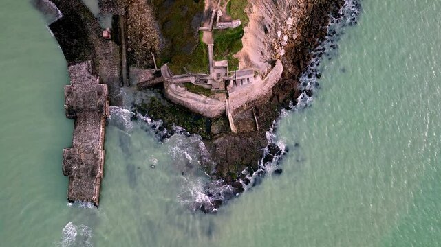 Aerial view of Arnika fortress on rocky coastline, France.