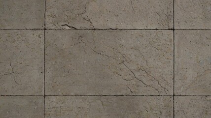 Naklejka premium Top-down view of textured concrete with central empty area, modern background