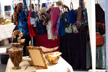 Handmade baby clothes at local market