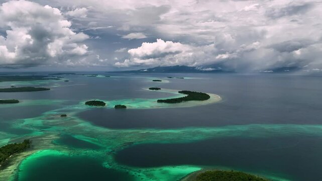 Aerial view of tropical reef and beach, Solomon Islands.