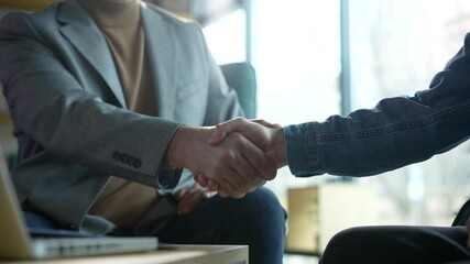 Handshake, meeting and hands of business people for thank you, agreement and collaboration. Corporate, professional and workers with gesture for partnership, job promotion and networking in office - Powered by Adobe