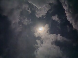 Bright Sun Shining Through Dramatic Storm Clouds
