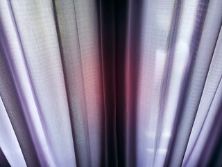 Elegant Sheer Purple Curtains Bathed in Light