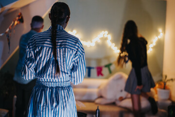 People arranging decorations for a birthday party at home, creating a delightful experience.