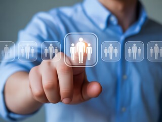 Person selecting from digital human resource icons human resources selection